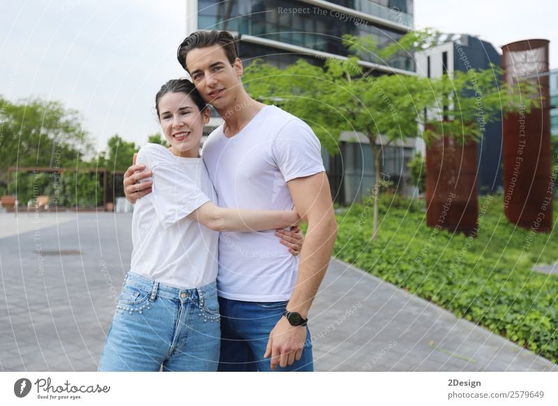 Young beautiful couple posing wearing jeans and t-shirt Lifestyle Style Happy Beautiful Woman Adults Man Friendship Couple 2 Human being 18 - 30 years