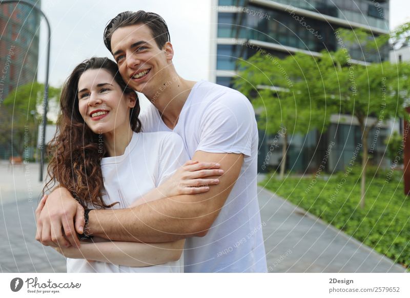 Young beautiful couple posing wearing jeans and t-shirt Lifestyle Style Happy Beautiful Woman Adults Man Friendship Couple 2 Human being 18 - 30 years