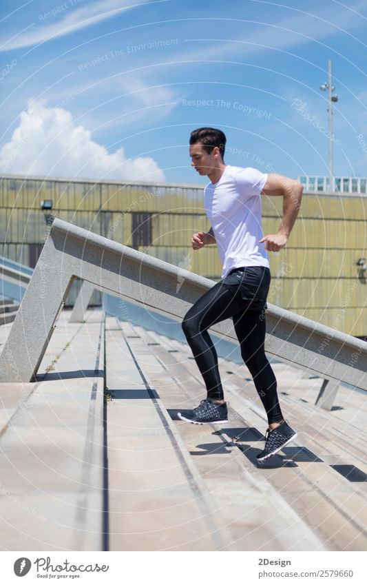 Muscular man working out in the city Lifestyle Body Relaxation Summer Sports Human being Masculine Man Adults Fitness Jump Strong Black Self-confident Power