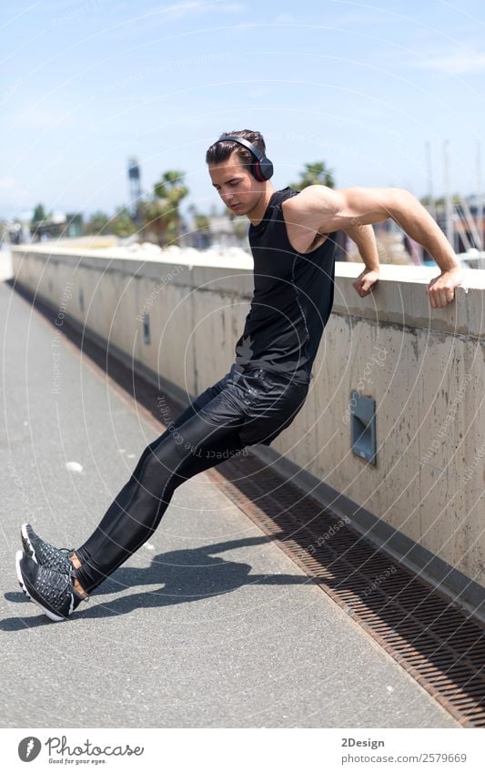 Muscular man stretching outdoors Lifestyle Body Relaxation Summer Sports Human being Masculine Young man Youth (Young adults) Man Adults 1 18 - 30 years Fitness