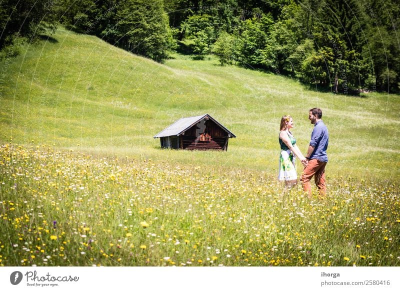 happy lovers on Holiday in the alps mountains Lifestyle Happy Beautiful Relaxation Vacation & Travel Adventure Summer Mountain Woman Adults Man Couple Partner