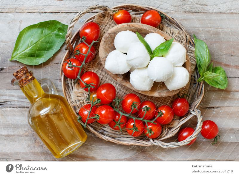 Italian cheese mozzarella Nutrition Vegetarian diet Bowl Ball Wood Soft Green Red White Tradition Meal mediterranean Mozzarella Apulia Snack Specialities