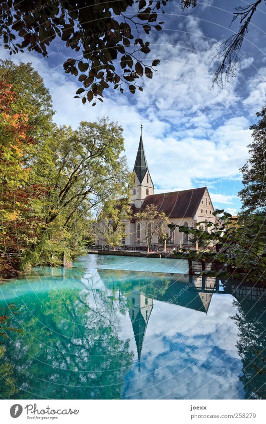 blue pot Nature Sky Clouds Autumn Beautiful weather Tree Pond Lake Source karst spring Church Blue Multicoloured Yellow Green Black Idyll Blautopf Colour photo