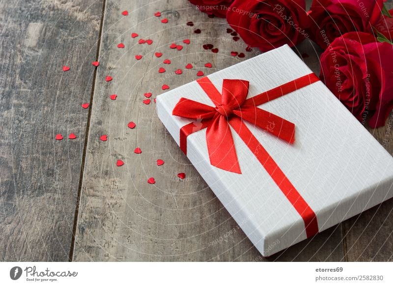 Gift box and red rose on wooden background.Valentines concept Rose Box Valentine's Day Mother's Day Wood Birthday romantic Feasts & Celebrations Love Flower