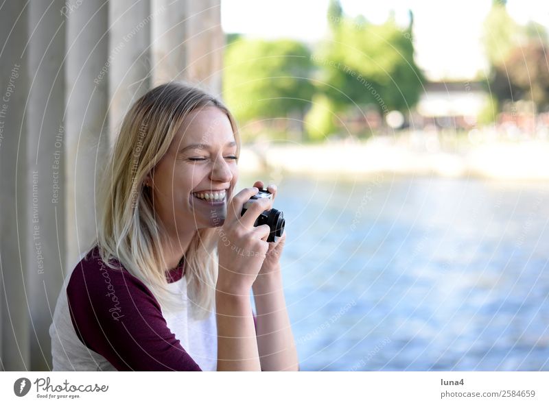 Woman with old camera Lifestyle Joy Happy Beautiful Contentment Leisure and hobbies Tourism Summer Camera Young woman Youth (Young adults) Adults Water River