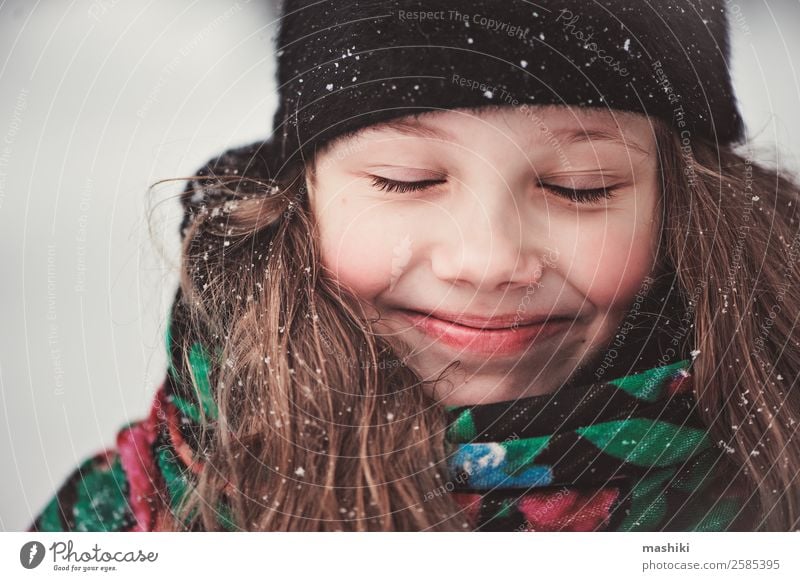 close up winter portrait of happy kid girl Joy Beautiful Winter Snow Winter vacation Child Snowfall To enjoy Action Caucasian romantic Seasons Walking