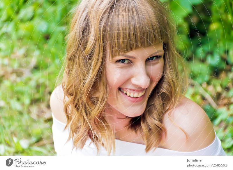 laughing young woman with blond hair in sunlight Eating Happy Hair and hairstyles Make-up Summer To talk Woman Adults 18 - 30 years Youth (Young adults) Fashion