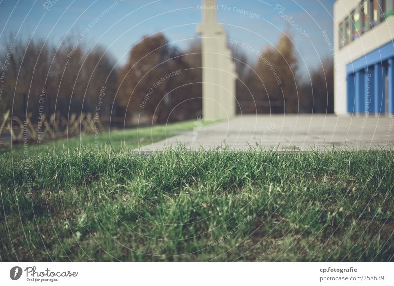 artificial turf Exterior shot Grass Lawn Column Building Playground Beautiful weather Blur Sunlight