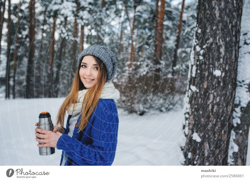 beautiful young woman relaxing on winter walk Lifestyle Joy Relaxation Vacation & Travel Winter Snow Winter vacation Woman Adults Nature Weather Snowfall Tree