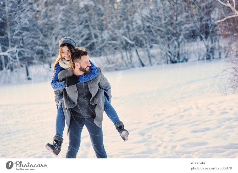 happy loving couple walking in snowy winter forest Lifestyle Joy Relaxation Leisure and hobbies Vacation & Travel Freedom Winter Snow Man Adults Couple Forest