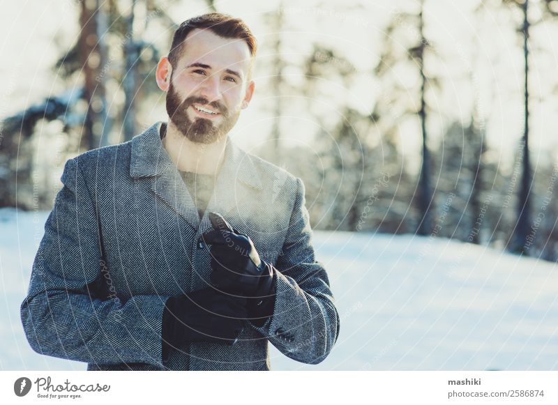 beautiful young bearded men on winter walk Lifestyle Joy Happy Relaxation Leisure and hobbies Knit Vacation & Travel Freedom Winter Snow Man Adults Forest