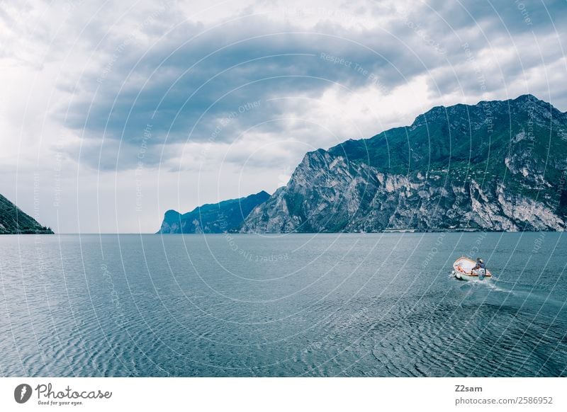 Lake Garda | Italy | Motorboat Nature Landscape Sky Clouds Autumn Climate Climate change Alps Mountain Lakeside Boating trip Fishing boat Driving Dark Cold