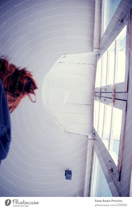 prospects. 1 Human being Window Ceiling Window pane Window frame Hair and hairstyles Red-haired Chignon Cold Sadness Looking away Colour photo Subdued colour