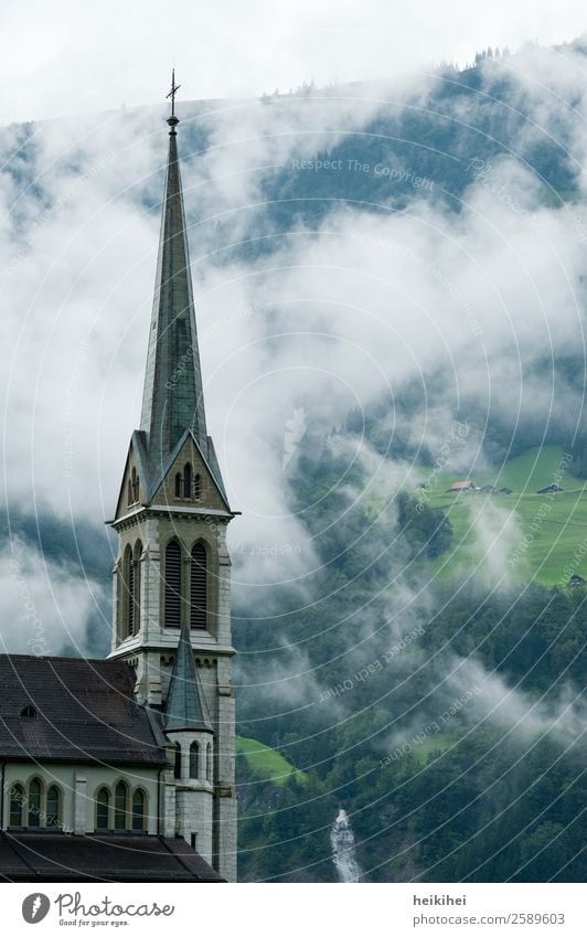 Church tower in front of foggy landscape Nature Landscape Fog Tree Field Forest Hill Mountain Village Small Town Sports Hiking Cold Brown Gray Green Calm