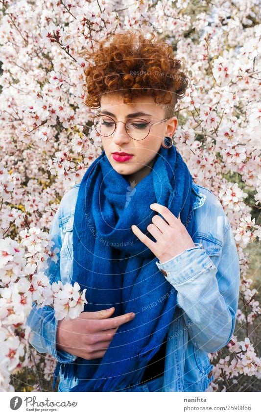 Young beautiful woman surrounded by flowers Lifestyle Style Joy Happy Beautiful Hair and hairstyles Freedom Human being Feminine Young woman