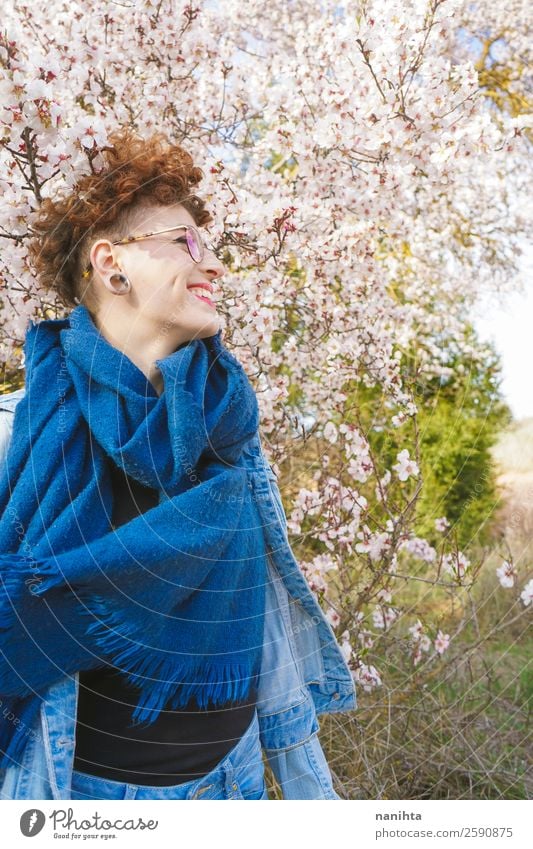 Young redhead woman surrounded by flowers Lifestyle Style Joy Happy Beautiful Hair and hairstyles Freedom Human being Feminine Young woman Youth (Young adults)