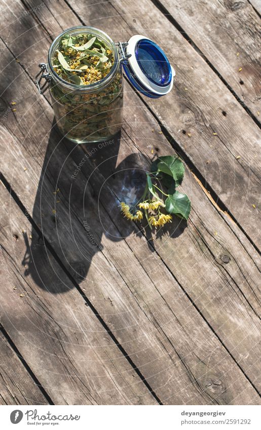 Jar with Linden blossom on wooden table Herbs and spices Tea Summer Nature Plant Tree Flower Leaf Blossom Fresh Natural Green linden lime branch herbal Floral