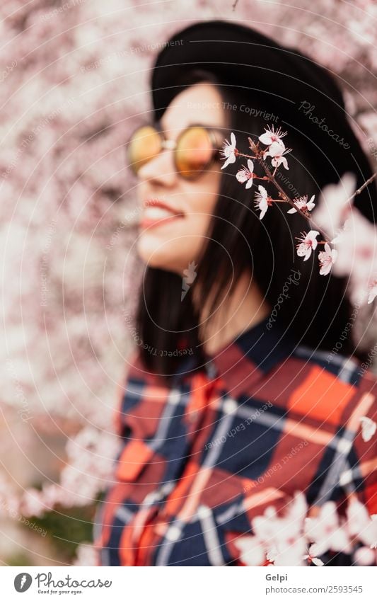 Brunette girl Style Happy Beautiful Face Garden Human being Woman Adults Nature Tree Flower Blossom Park Fashion Sunglasses Hat Smiling Happiness Fresh Long