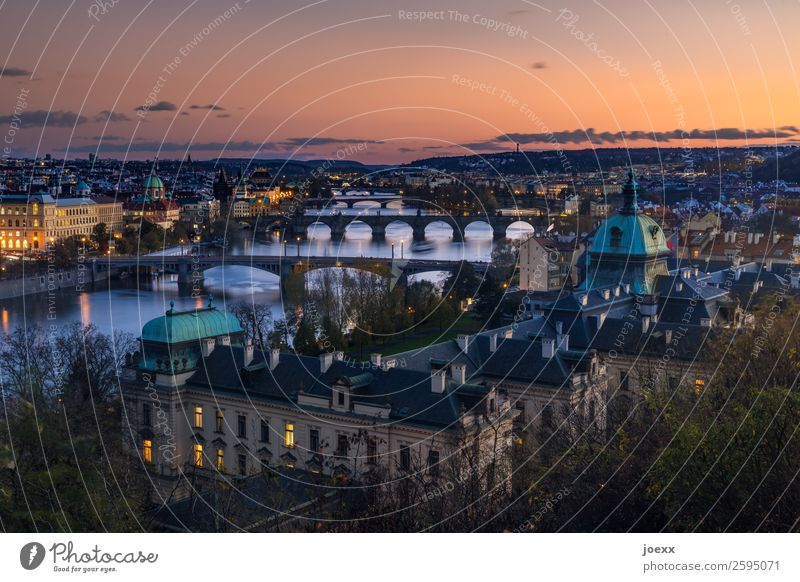 View of Prague's old town with many bridges over the Moldau after sunset Czech Republic The Moldau Artificial light Charles Bridge Tourist Attraction Old town