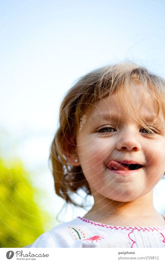 Blond girl licking her lips Blonde Braids Caucasian Cheek Child Close-up Dress Eyes Face Flavorsome Girl Gold Time Indie Lick Lips Small Love Lovely Ones Pamper