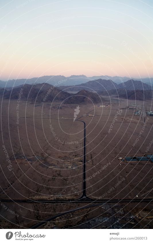 900 Environment Nature Earth Sky Cloudless sky Drought Hill Rock Mountain Desert Exceptional Street Egypt Direct Right ahead Colour photo Exterior shot Deserted