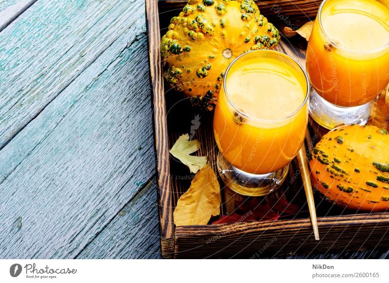 Beverage with pumpkins smoothie drink autumn fall food glass vegetable fallen leaves beverage healthy orange fresh vegetarian copy space cocktail juice dessert