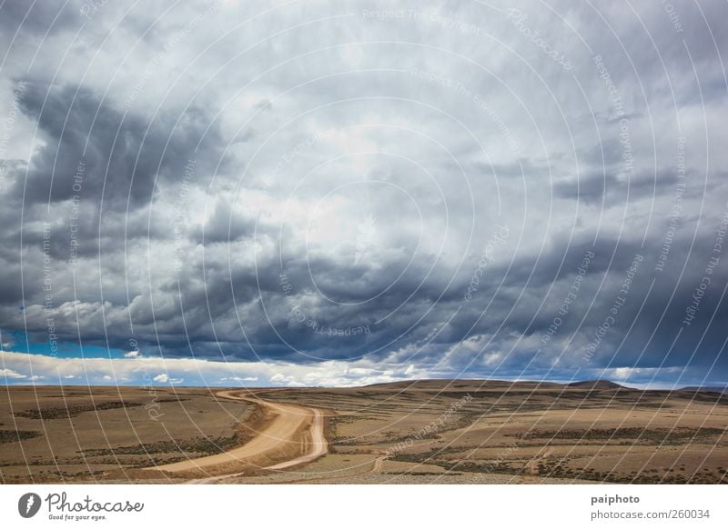 Road and stormy clouds Adventure Argentina Black Blue Brown Chile Clouds Desert Earth Gray Loneliness Patagonia Rain Remote Street Sky Storm Dark