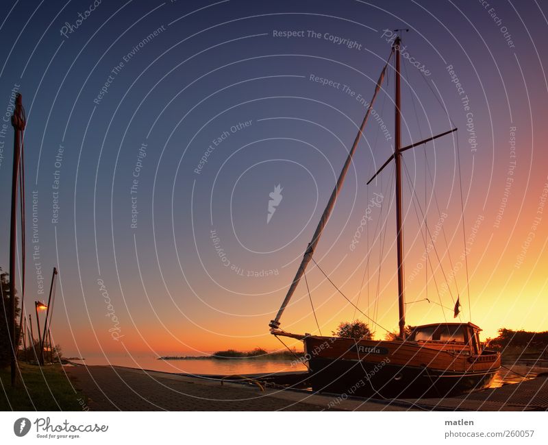 Attila Water Sky Cloudless sky Night sky Sunrise Sunset Autumn Beautiful weather Navigation Sailboat Harbour Blue Brown Gold Calm Drop anchor Lantern Fog bank