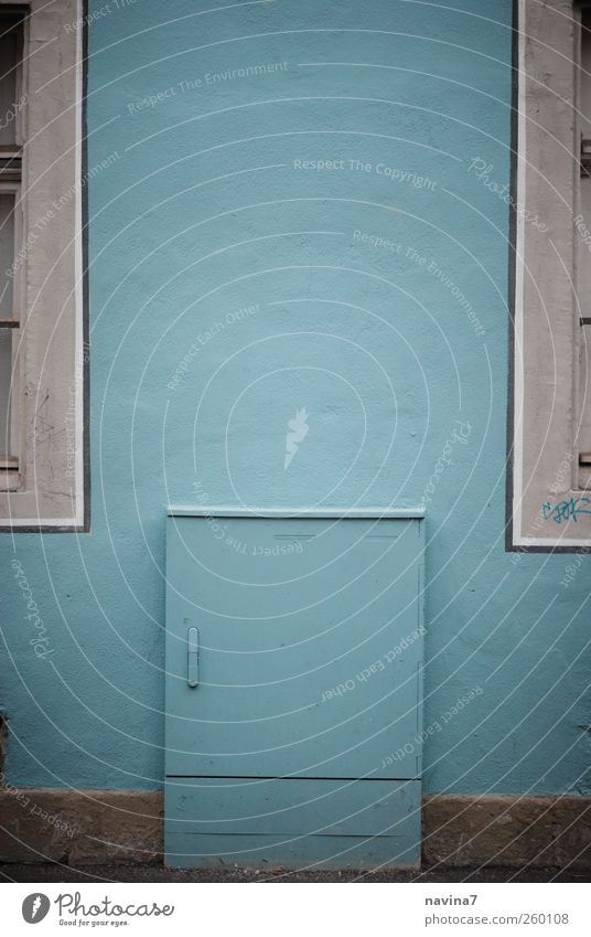 power box Deserted Wall (barrier) Wall (building) Facade Stone Blue Symmetry Turquoise Energy industry Camouflage Colour photo Exterior shot Copy Space top