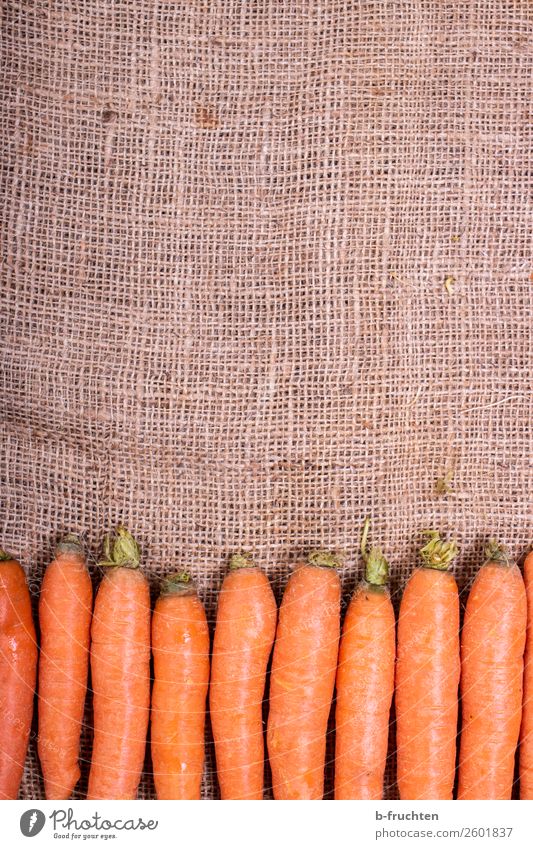 Carrots on a jute sack Food Vegetable Organic produce Vegetarian diet Slow food Healthy Eating Kitchen Packaging Sack Select Fresh Orange Quality Jute sack