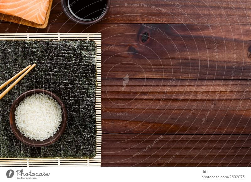 Sushi Ingredients Healthy food prepare preparing cooking nori Seaweed dry Dried makisu Mat bamboo mat Japanese Chopstick soy Sauce Rice Salmon fish sheet Asian