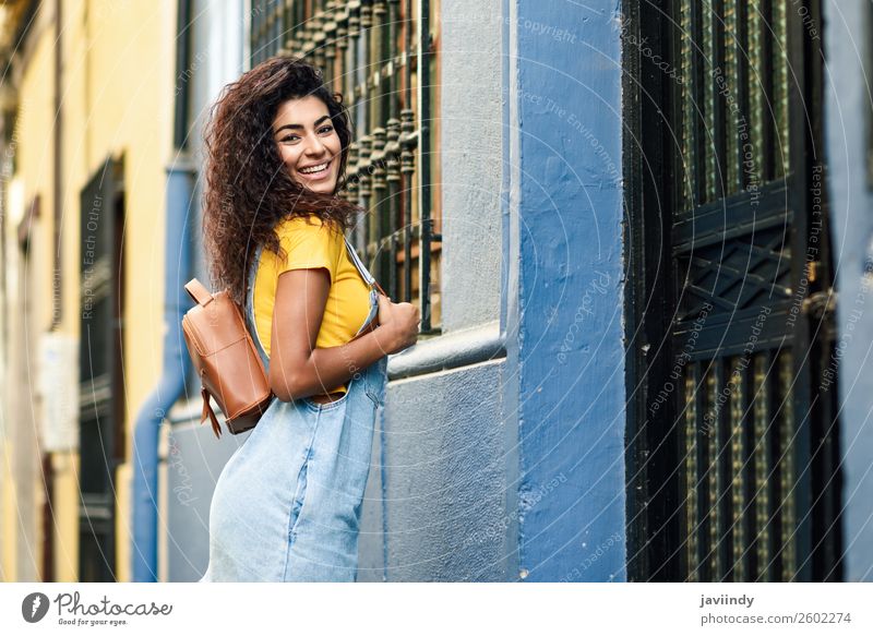 African woman with black curly hairstyle outdoors. Lifestyle Style Happy Beautiful Hair and hairstyles Face Tourism Human being Feminine Young woman