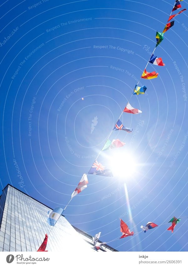 Flag in the wind 1 Cloudless sky Sunlight Beautiful weather Town Deserted High-rise Decoration Paper chain Ensign International Cosmopolitan Blue Multicoloured