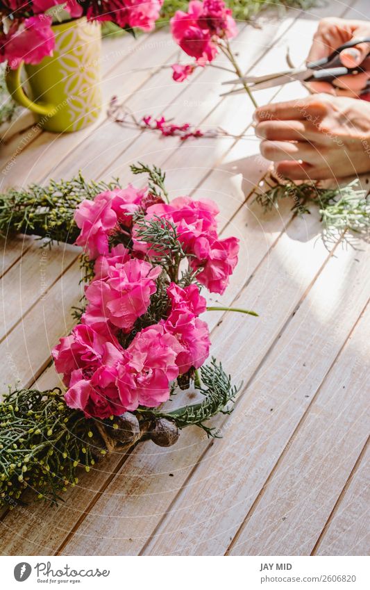 Florist at work: Creating a wooden wreath with branches pine Decoration Feasts & Celebrations Mother's Day Thanksgiving Christmas & Advent New Year's Eve