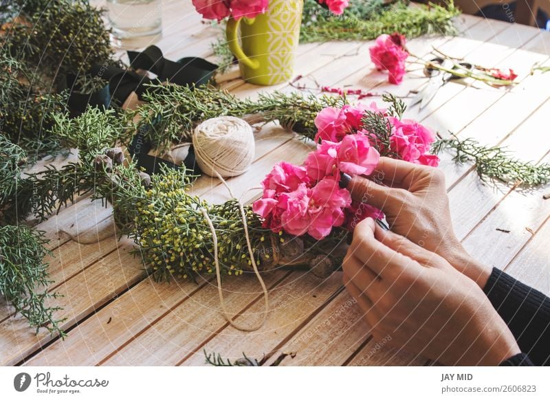 Creating a wooden wreath with branches pine and pink flowers Lifestyle Decoration Thanksgiving Christmas & Advent New Year's Eve Work and employment