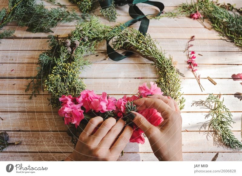 Creating a wooden wreath with branches pine and pink flowers Decoration Thanksgiving Christmas & Advent New Year's Eve Work and employment Craft (trade) Woman