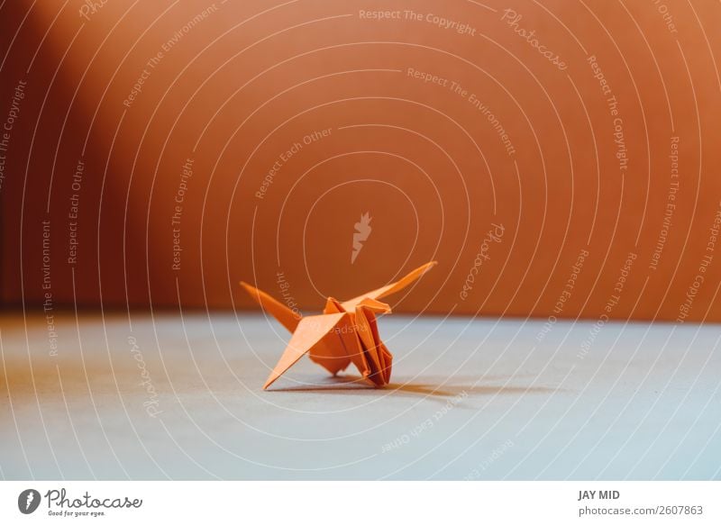 Orange origami bird , a bird made of paper-origami. Design Leisure and hobbies Handcrafts Decoration Craft (trade) Art Culture Animal Bird Paper Toys Hope Peace