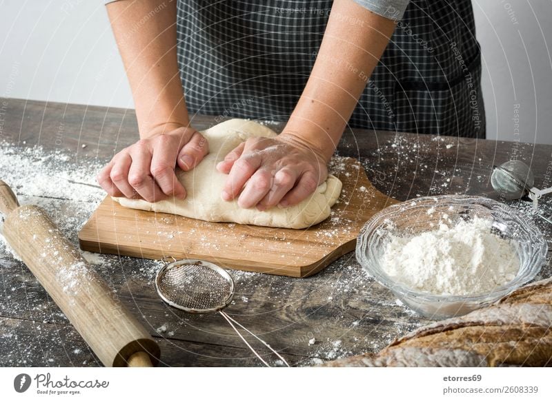 Woman kneading bread dough Bread Make Hand Kitchen Apron Flour Yeast Home-made Baking Dough Human being Preparation Stir Ingredients Raw