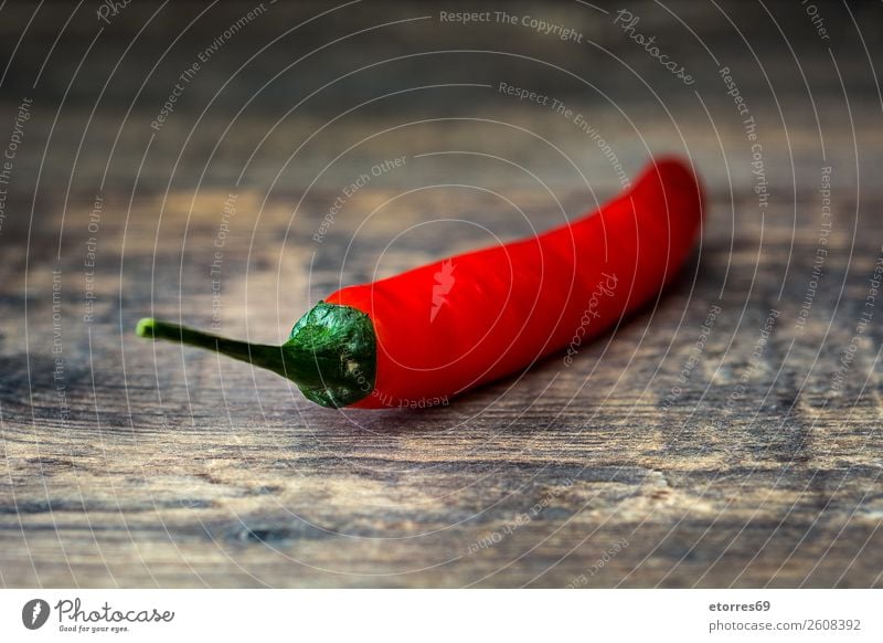 Red chili pepper on wooden table Pepper Chili Spicy Vegetable Food Healthy Eating Food photograph Chile Herbs and spices Burn Cooking Fresh Hot Ingredients