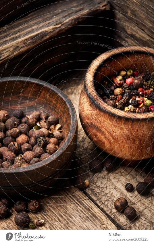 Pepper peas or peppercorn spice black pink peppercorn red pepper pepperbox seed seasoning dry spicy closeup macro condiment heap spoon organic aromatic flavor