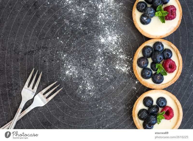 Delicious tartlets with raspberries and blueberries Tartlet Blueberry Raspberry Fruit Dessert Food Healthy Eating Food photograph Dish Cream custard Snack