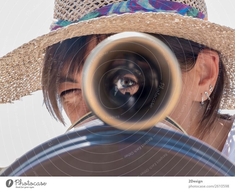 Woman using a binoculars in the city looking to you Beautiful Vacation & Travel Tourism Trip Human being Feminine Young woman Youth (Young adults) Adults 1