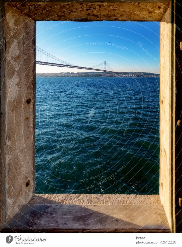 View through window on bridge Ponte Vasco da Gama over the Tajo near Lisbon Beautiful weather Tourist Attraction Tejo Bridge already Blue Colour photo