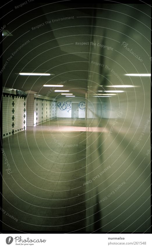 down through Environment Deserted Tunnel Wall (barrier) Wall (building) Station hall Sign Cold Trashy Gloomy Moody Vacation & Travel Reflection Lighting White