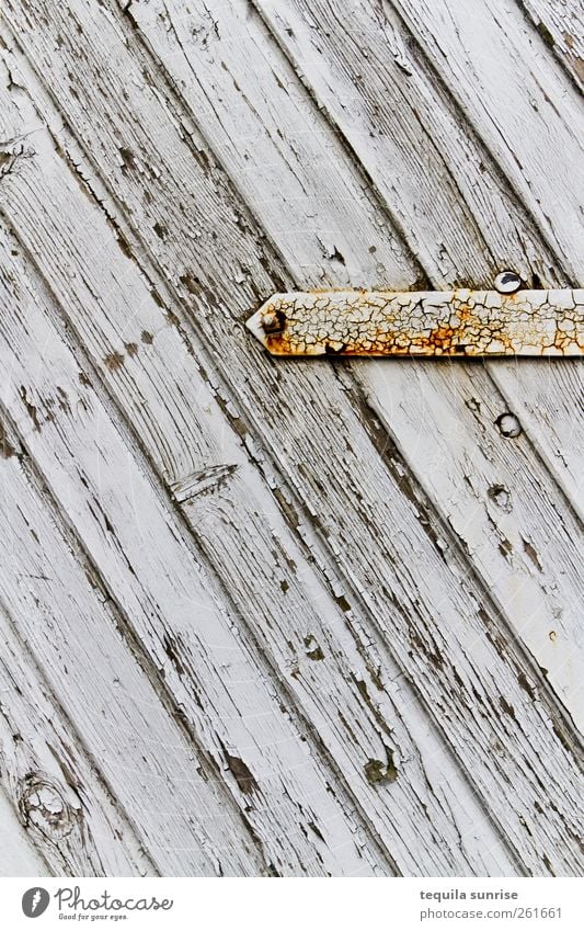 wooden gate Gate Door Wood Metal Old Yellow Gold Gray White Dye Derelict Weathered Rust Stripe Colour photo Subdued colour Exterior shot Detail