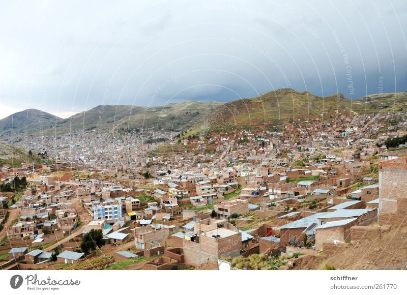 Take a deep breath - Puno Storm clouds Bad weather Hill Mountain Small Town Outskirts House (Residential Structure) Detached house Manmade structures Building