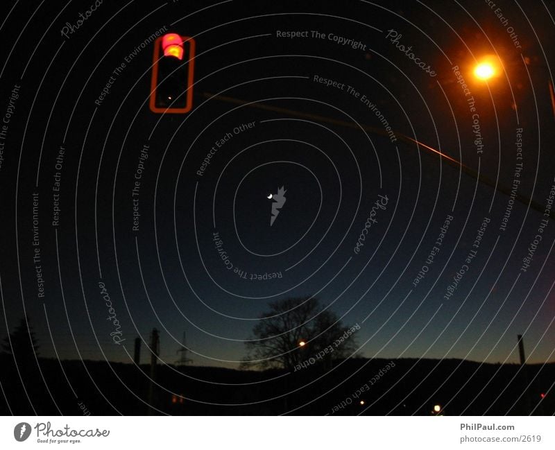 Red traffic light and crescent moon Traffic light Night Dark Moon Blue Sky