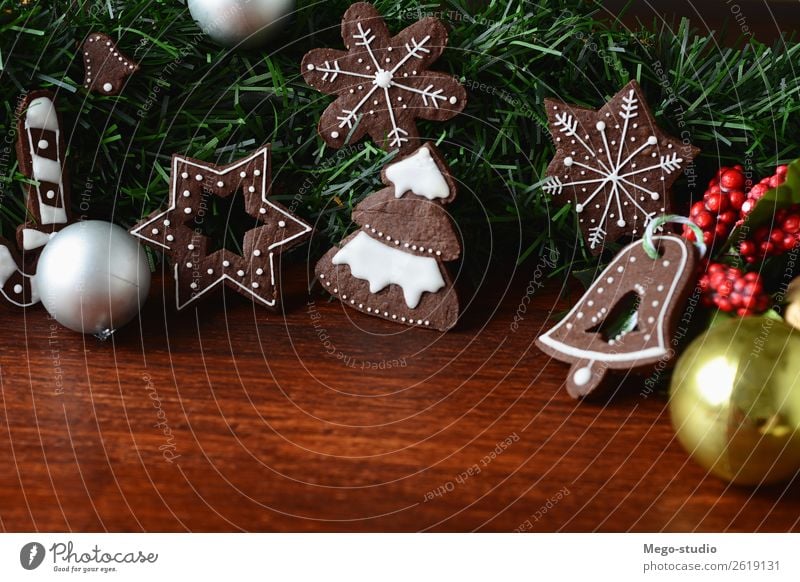 Christmas cookies hanging under festive branches. Dessert Winter Decoration Table Feasts & Celebrations Christmas & Advent New Year's Eve Tree Wood Ornament