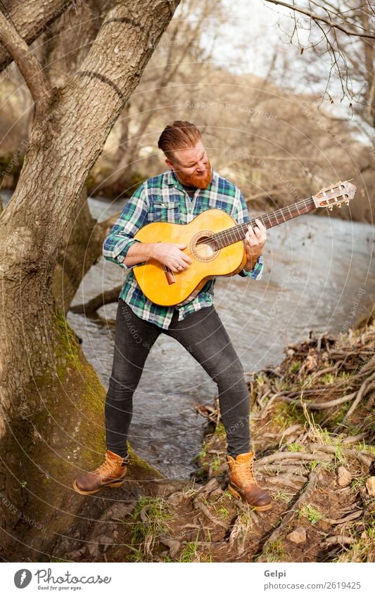 Red haired man Leisure and hobbies Playing Entertainment Music Human being Man Adults Musician Guitar Nature River Red-haired Moustache Cool (slang)