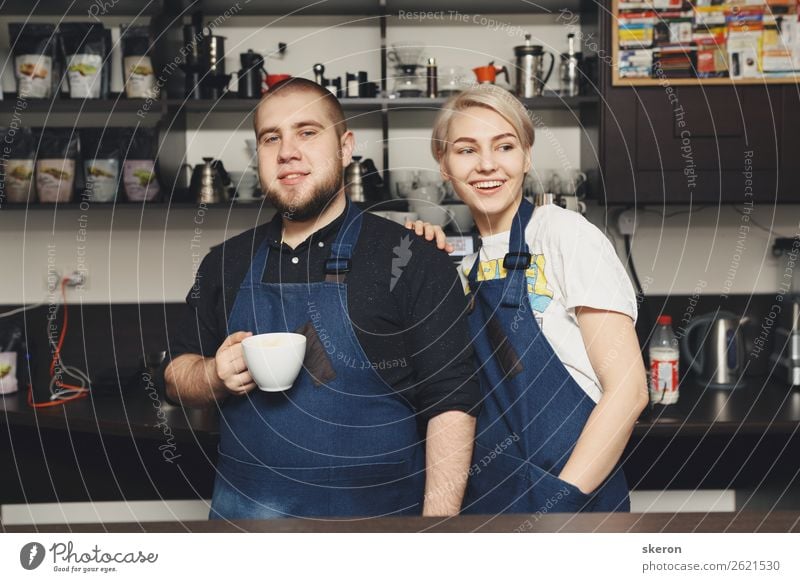 smiling Barista in the workplace at the coffee shop Breakfast Lunch To have a coffee Beverage Hot Chocolate Mug Lifestyle Harmonious Well-being